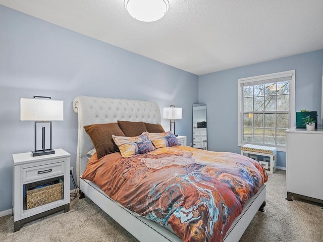 bedroom featuring light colored carpet