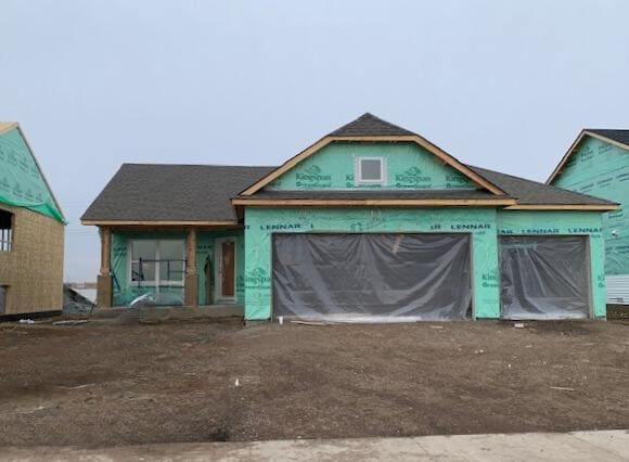 property under construction with a garage