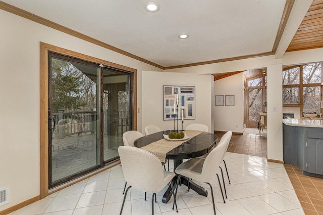 dining area with crown molding, light tile patterned floors, recessed lighting, and baseboards