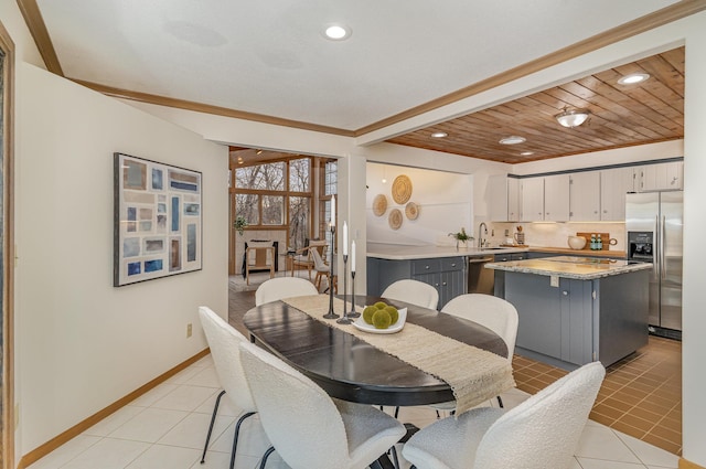 dining room featuring beam ceiling, light tile patterned floors, recessed lighting, and baseboards