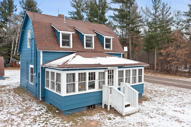 view of snow covered property