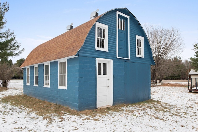 view of snow covered property