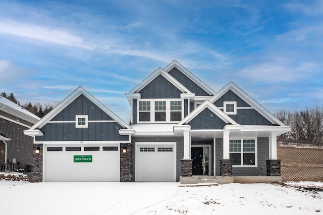 craftsman-style home with a garage