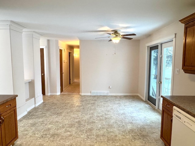 unfurnished living room with ceiling fan