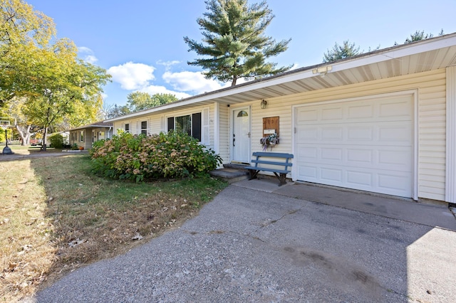 single story home with a garage