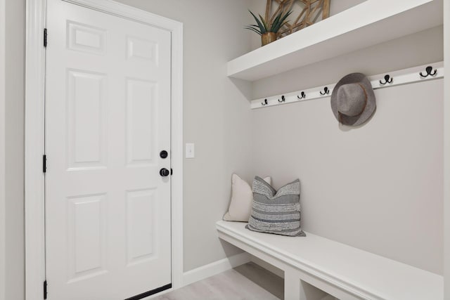 mudroom with light hardwood / wood-style flooring