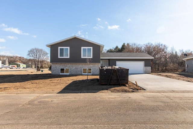 split level home with a garage