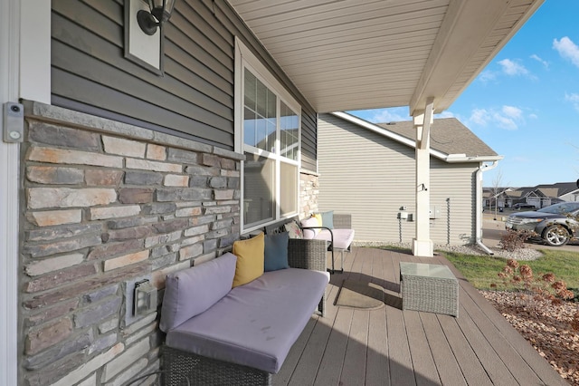 wooden terrace featuring a porch