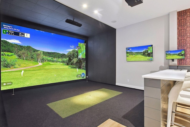 recreation room featuring carpet flooring and golf simulator