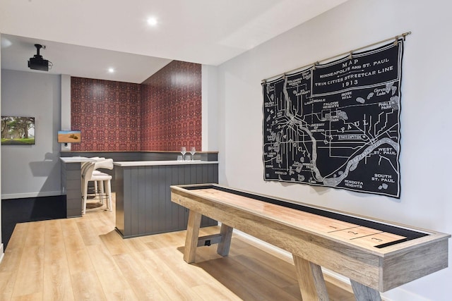 playroom with light hardwood / wood-style floors