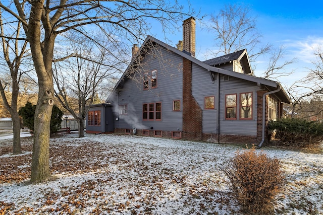 view of snow covered property