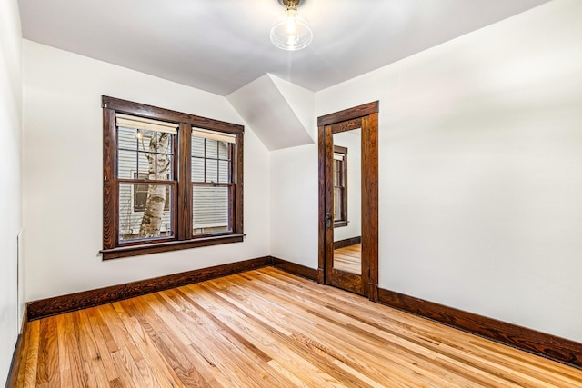 additional living space with light wood-type flooring