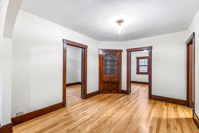 empty room with light wood-type flooring