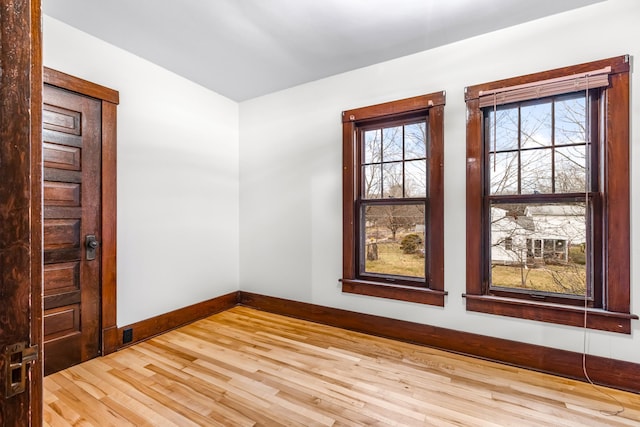 unfurnished room featuring wood-type flooring