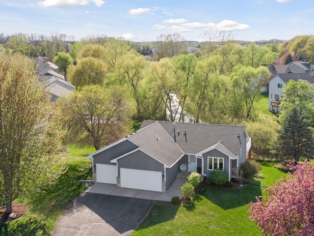 bird's eye view featuring a view of trees