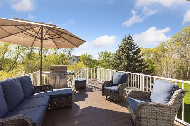 wooden deck featuring a grill and an outdoor living space