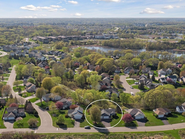 aerial view featuring a water view and a residential view
