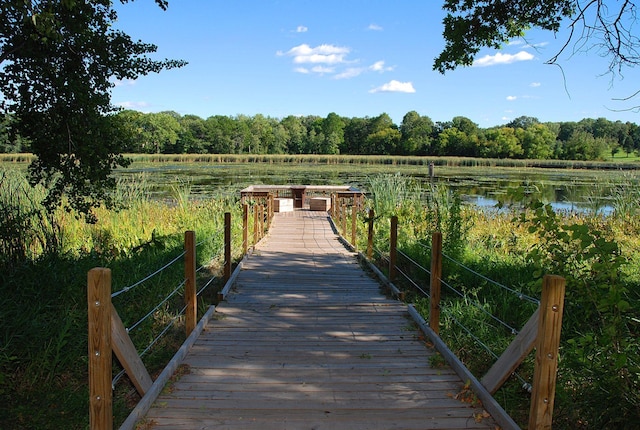 view of dock featuring a water view