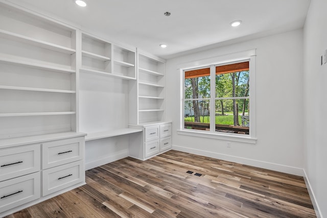 interior space with dark hardwood / wood-style flooring