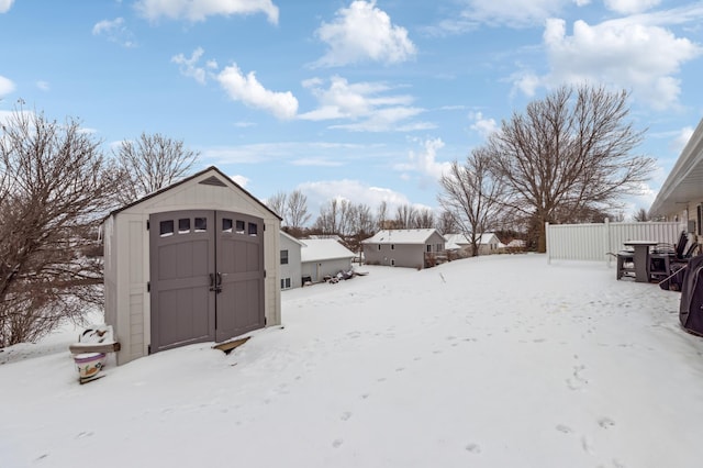 view of yard covered in snow