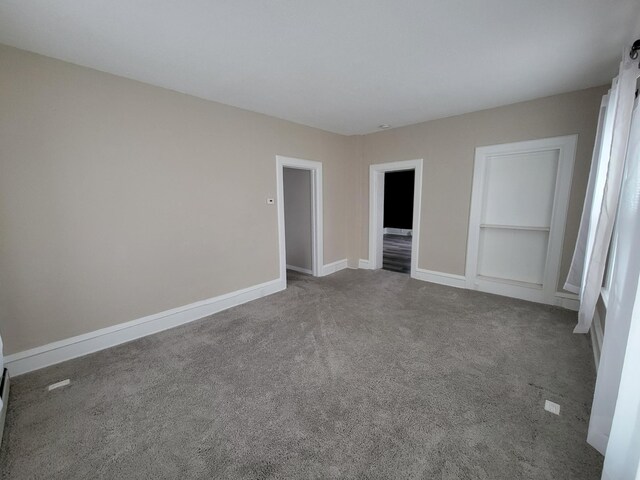 unfurnished bedroom featuring carpet flooring