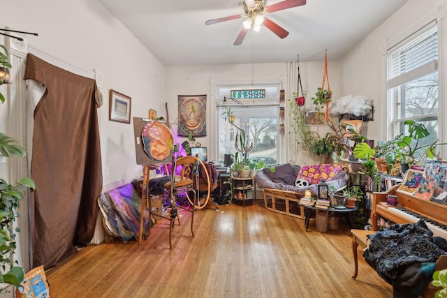 misc room featuring light hardwood / wood-style floors and ceiling fan