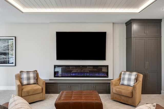 living room featuring light colored carpet and wooden ceiling