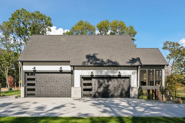 view of front of property with a garage