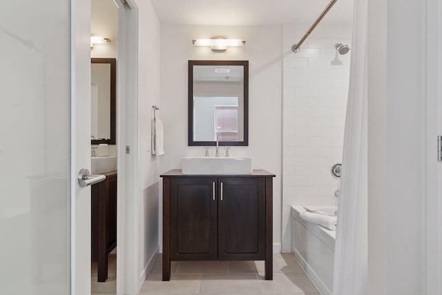 2825 Colfax Ave S Unit 211, Minneapolis, MN 55408 - full bathroom featuring vanity, bathing tub / shower combination, and tile patterned flooring