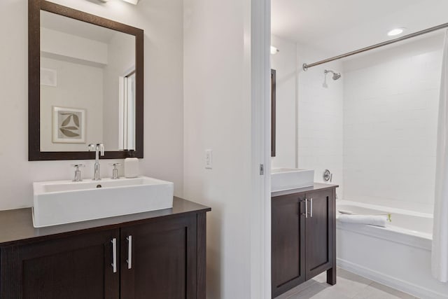 2825 Colfax Ave S Unit 211, Minneapolis, MN 55408 - bathroom featuring vanity, shower / washtub combination, tile patterned floors, and recessed lighting