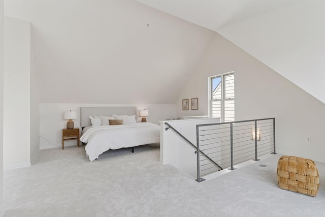 2825 Colfax Ave S Unit 211, Minneapolis, MN 55408 - carpeted bedroom featuring vaulted ceiling