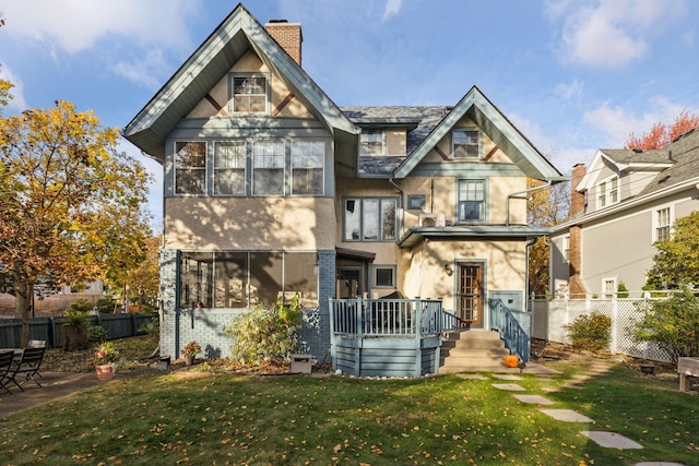 1941 James Ave S, Minneapolis, MN 55403 - view of front facade with a chimney and stucco siding