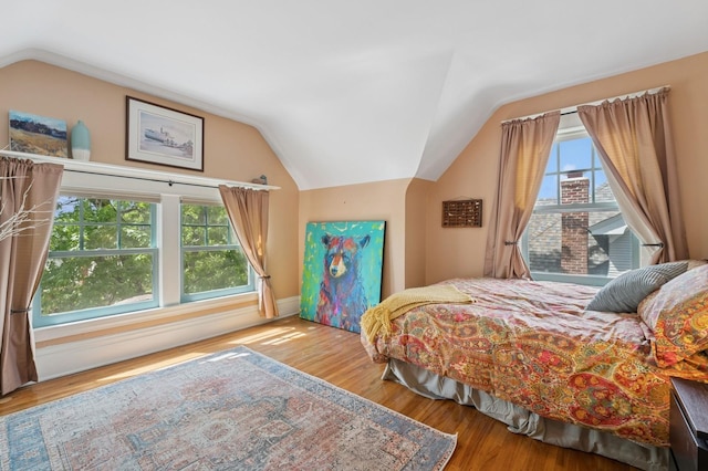 1941 James Ave S, Minneapolis, MN 55403 - bedroom with lofted ceiling and wood finished floors