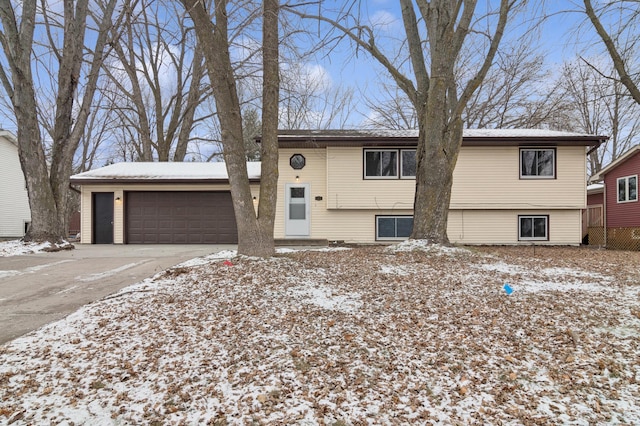 raised ranch featuring a garage