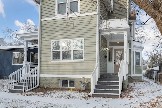 view of snow covered property