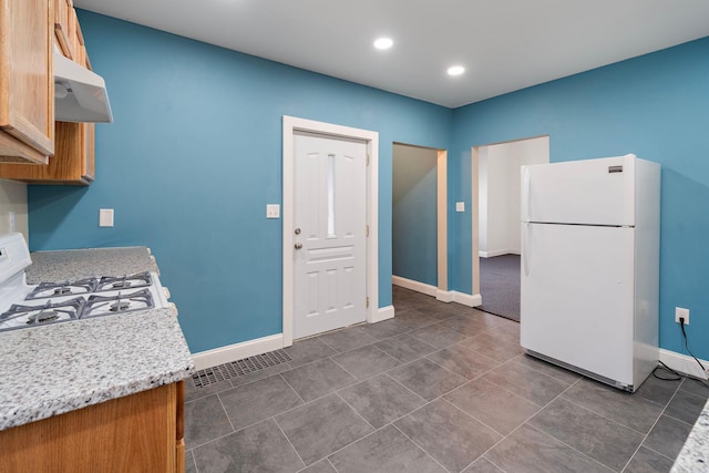 kitchen featuring white appliances