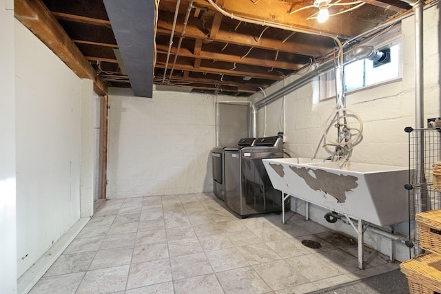 washroom with independent washer and dryer