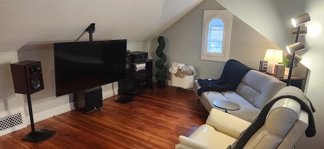 living room featuring dark wood-type flooring and lofted ceiling