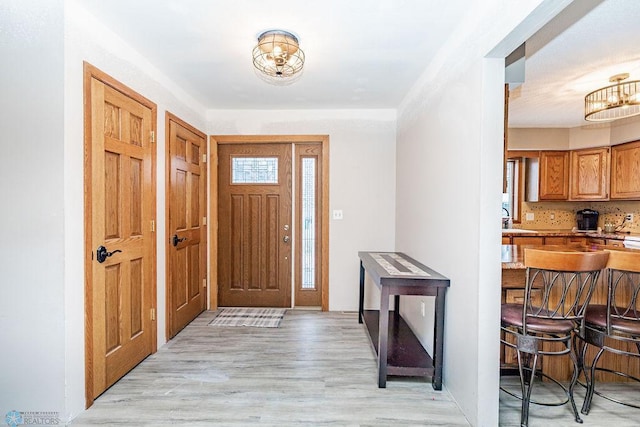 entryway with light wood-type flooring