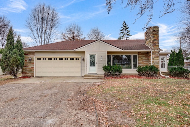 single story home featuring a garage