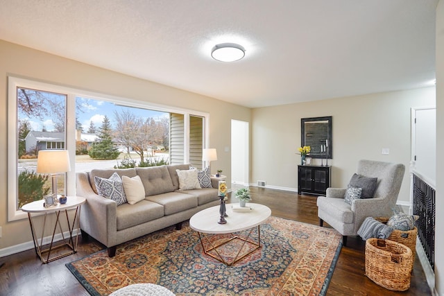 living room featuring dark hardwood / wood-style floors