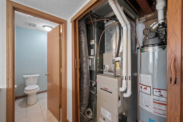 utility room with gas water heater