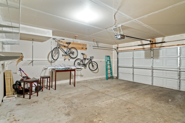 garage featuring a garage door opener