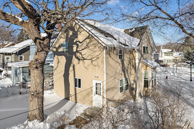 view of snow covered property