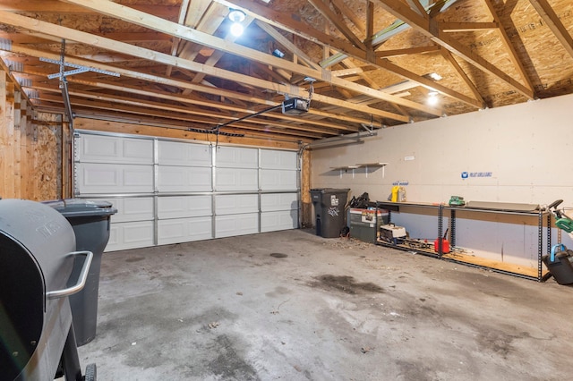 garage featuring a garage door opener