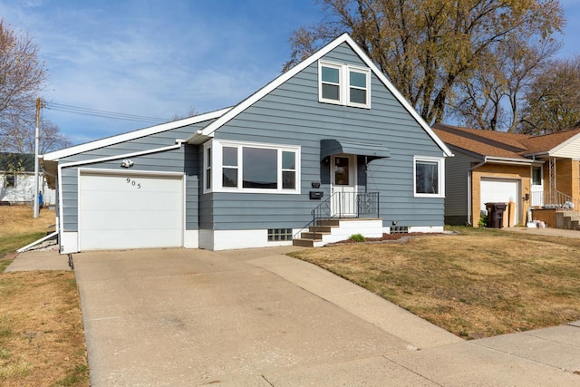 view of front facade with a garage and a front yard