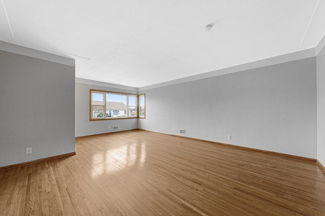 unfurnished living room with light wood-type flooring