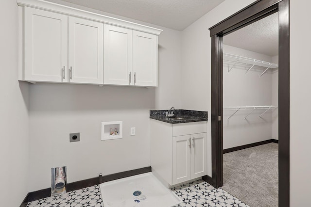 clothes washing area featuring electric dryer hookup, cabinets, light carpet, sink, and hookup for a washing machine