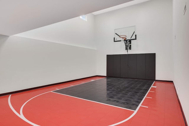 view of sport court featuring basketball hoop