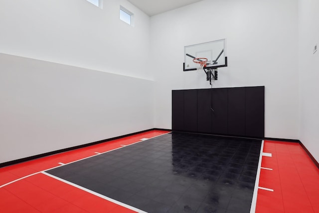 view of basketball court featuring basketball hoop